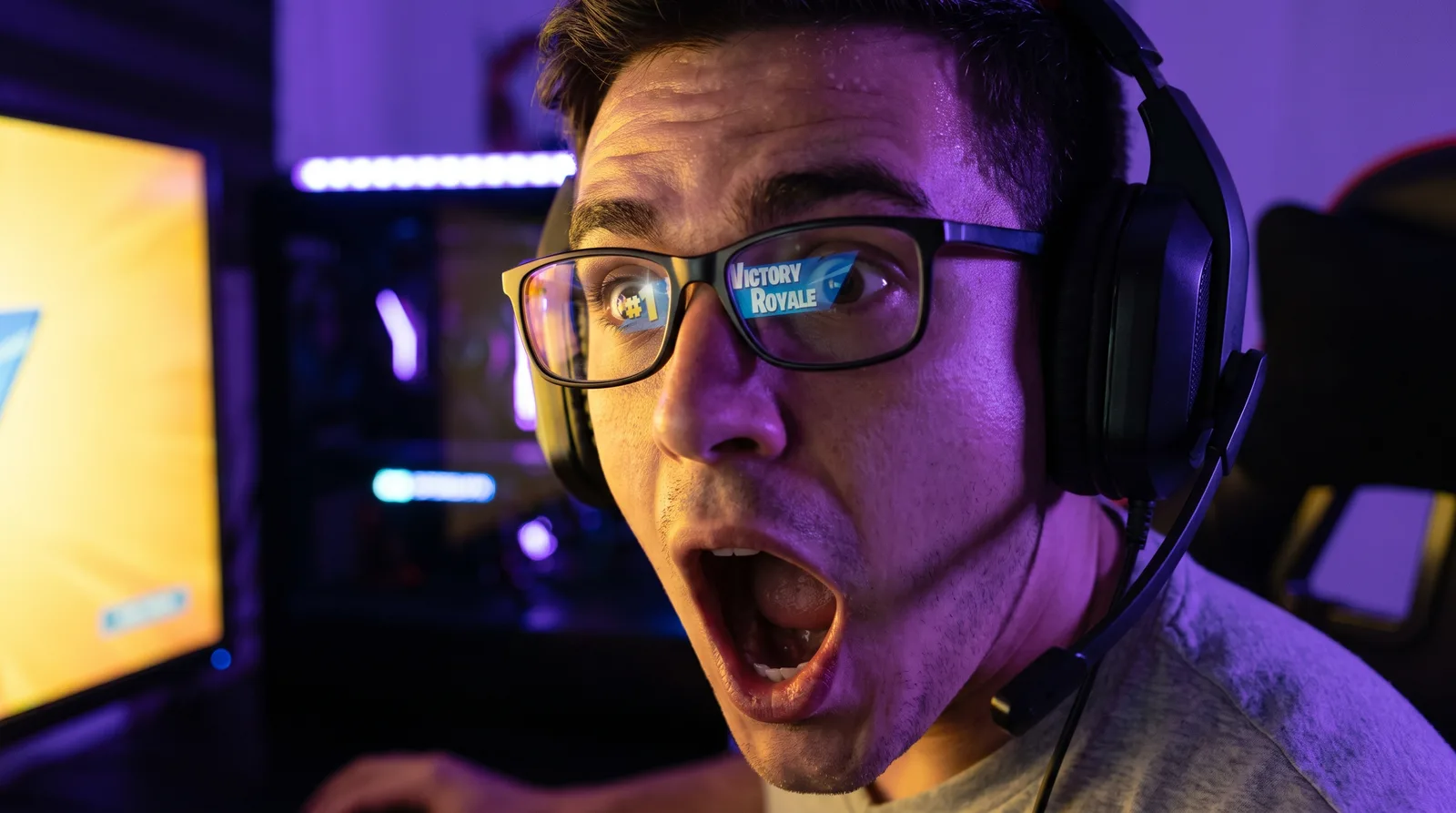 AI-generated thumbnail: a gamer with a shocked expression after a clutch Fortnite victory royale